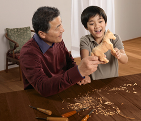 Grandfather playing with his granddaughter